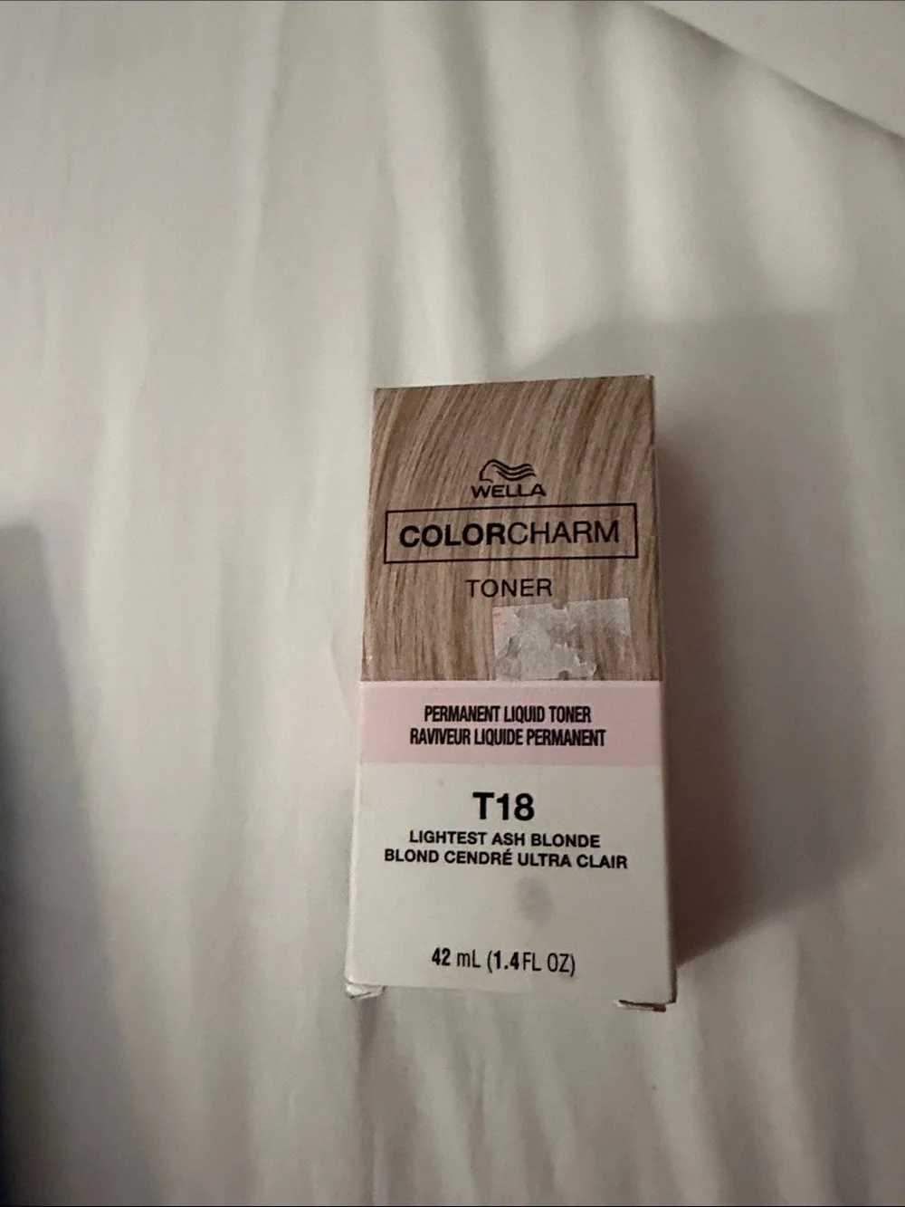 Wella ColorCharm Toner in Light Pink and White Packaging
